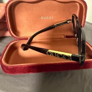 Gucci Elegant Black and Gold Design